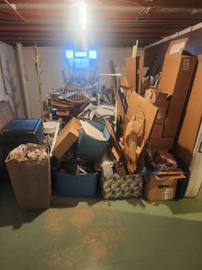 Roll-off dumpster container at job site for 2 Yard Dumpster Rental in North Londonderry